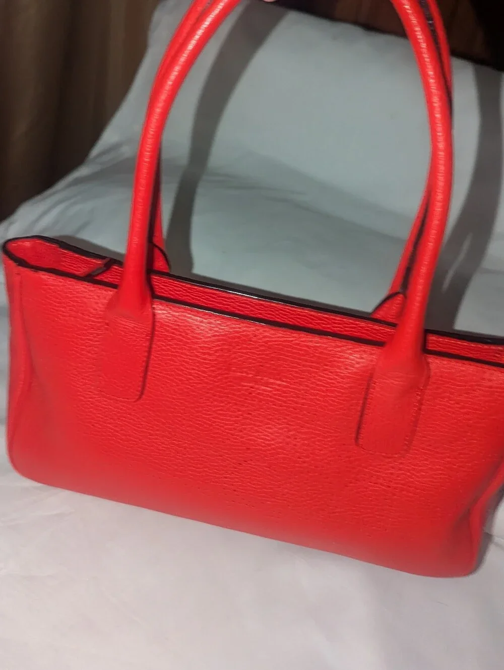 Kate Spade New York  Noel Rue Red Pebbled Perforated Leather Tote Bag.